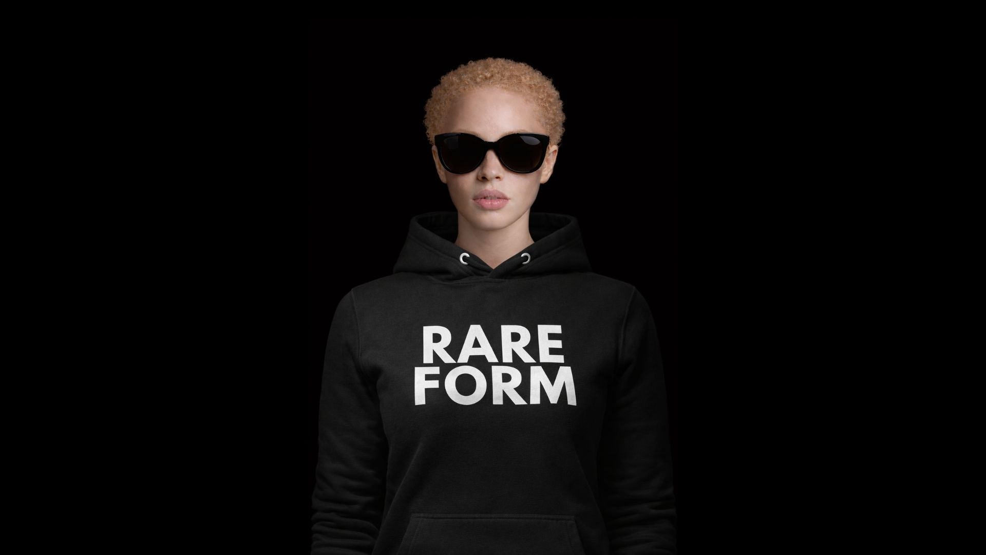 Mi wearing a RARE FORM hoodie and sunglasses for Say It Like You Mean It (SILYMI)